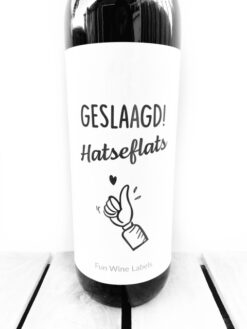 wijnetiket geslaagd hatseflats voor op een fles drank