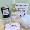 wijn & relaxbox liefste, met een flesje wijn, geurkaarsje en heerlijke relax spa producten.